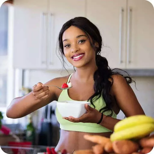 a woman holding a bowl of foods and a banana keto recipe diet